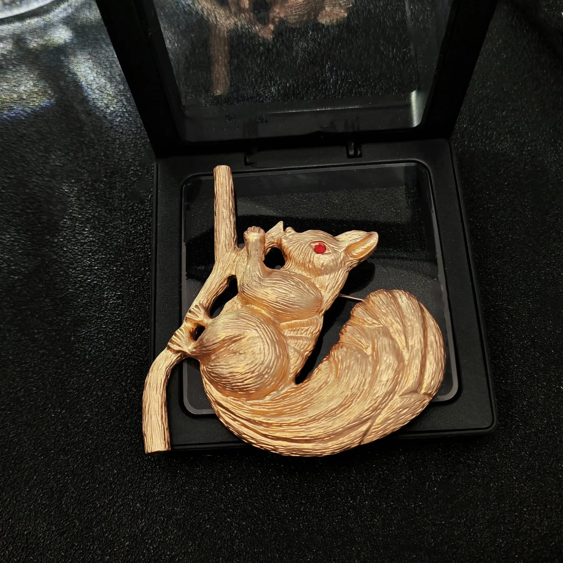 Adorable Gold - toned Squirrel Brooch on Branch with Red - eyed Detail