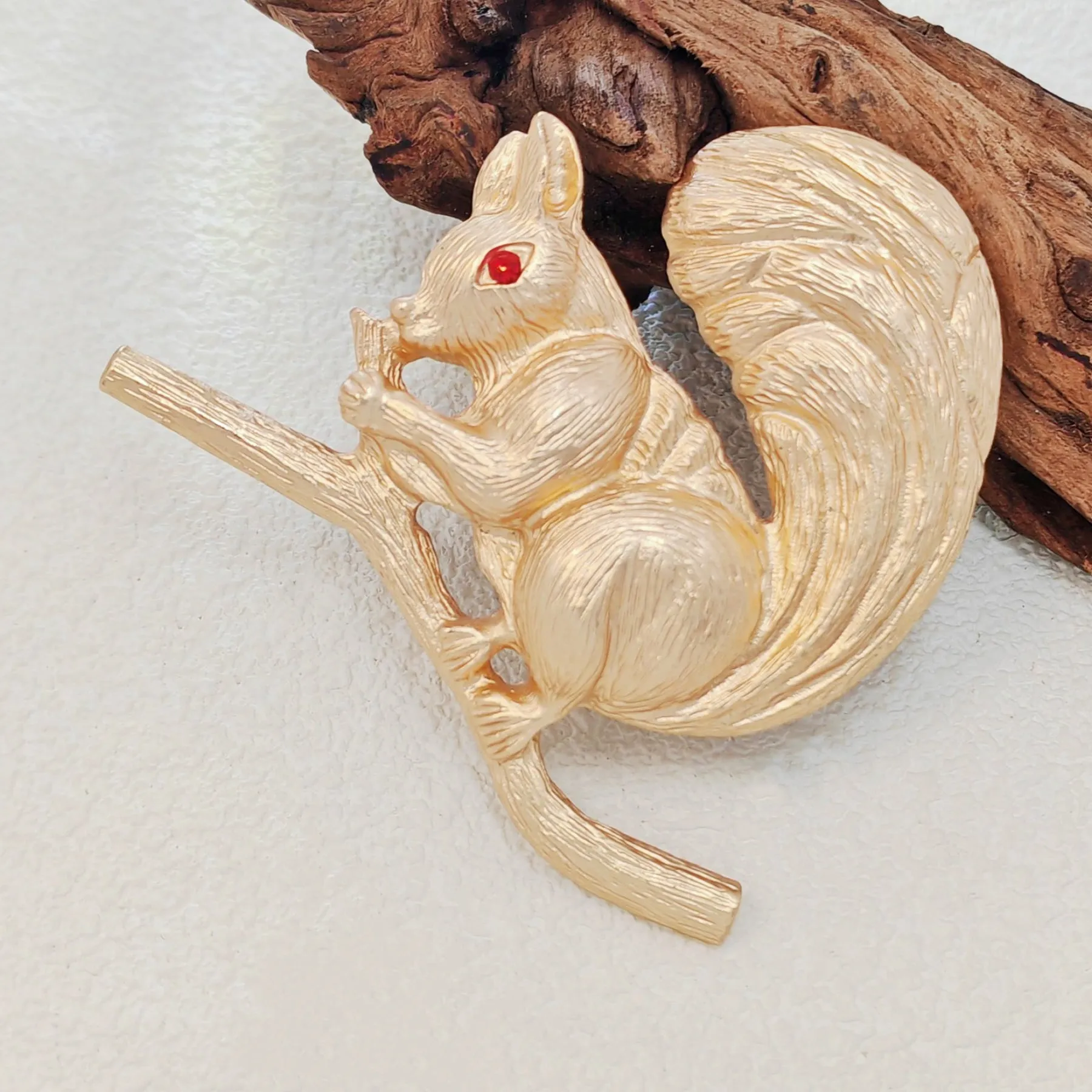 Adorable Gold - toned Squirrel Brooch on Branch with Red - eyed Detail
