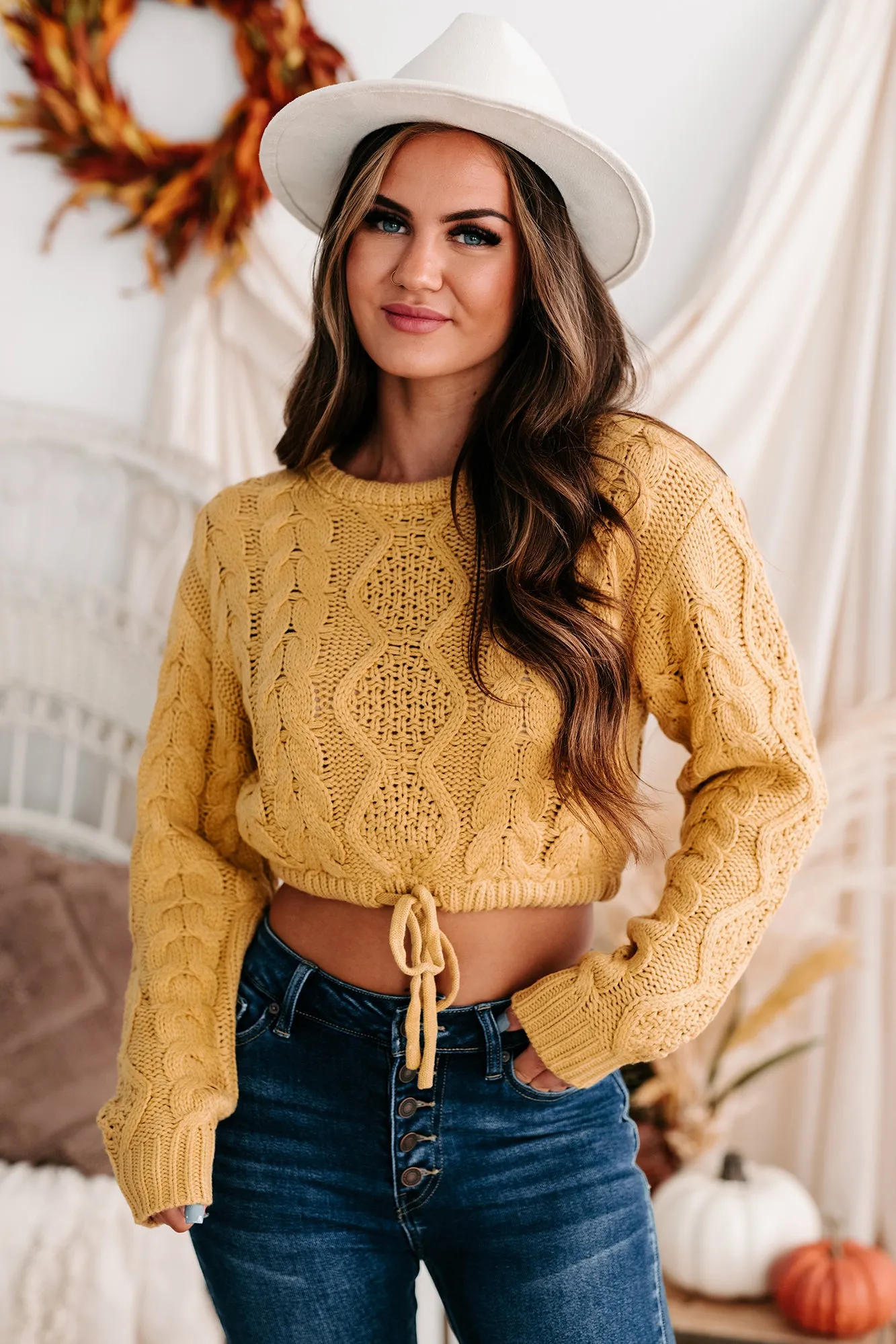 Points To Cozy Drawstring Hem Cropped Cable Knit Sweater (Honey Mustard)