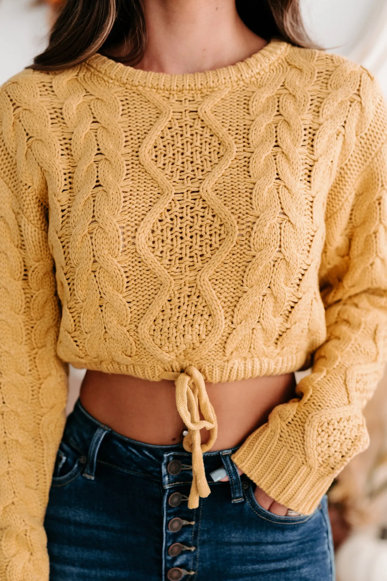 Points To Cozy Drawstring Hem Cropped Cable Knit Sweater (Honey Mustard)