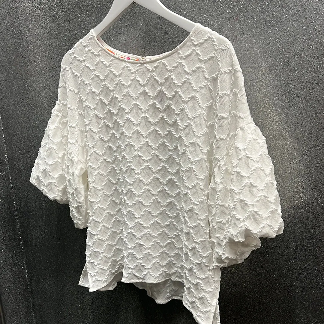 Textured cream top